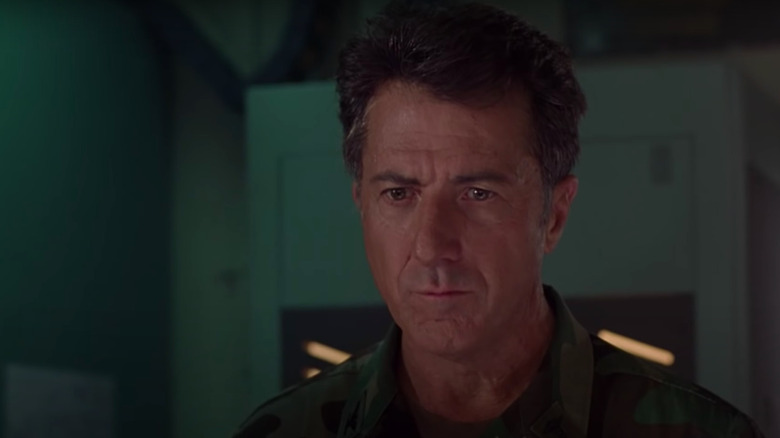 Dustin Hoffman looking down, concerned