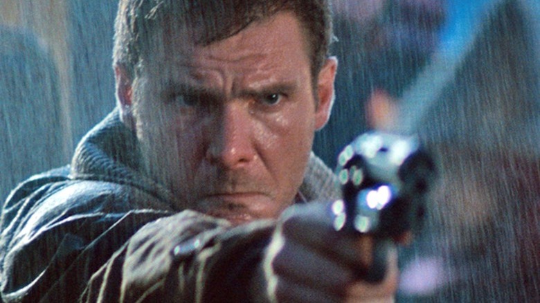 Deckard prepares to shoot a Replicant