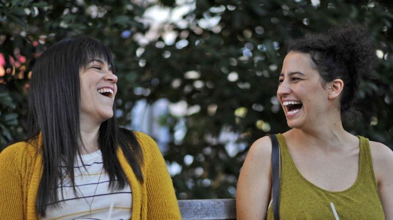 Abbi Jacobson and Ilana Glazer laughing
