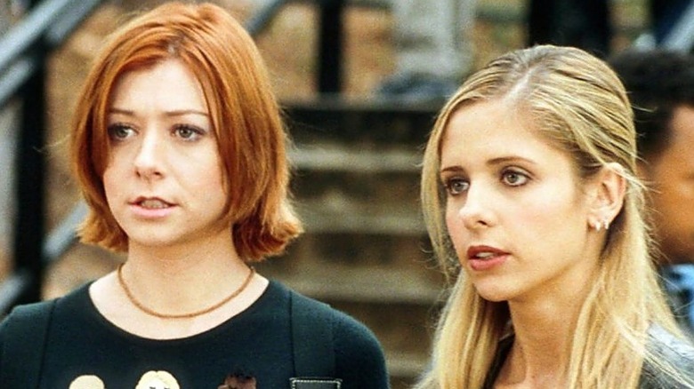 Alyson Hannigan and Sarah Michelle Gellar looking serious