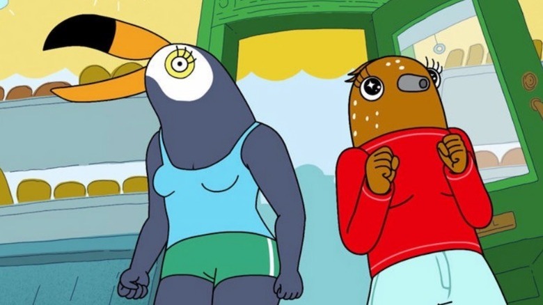 Tuca and Bertie standing in doorway