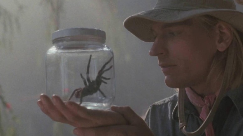 Julian Sands with spider