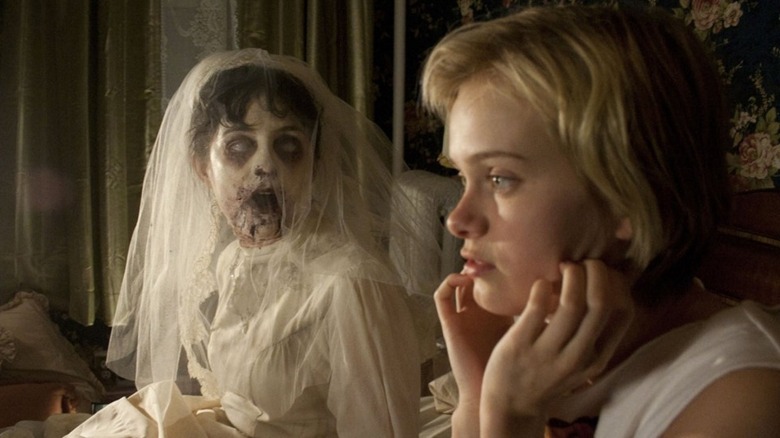 Ghostly bride looks at Sara Paxton
