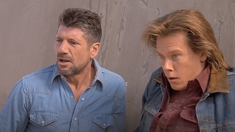 Fred Ward and Kevin Bacon looking shocked