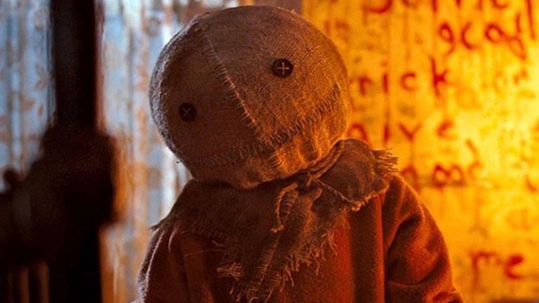 Sam from "Trick 'r Treat" with head cocked to the side