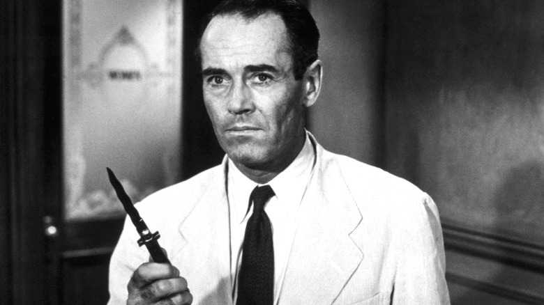Henry Fonda holds a switchblade