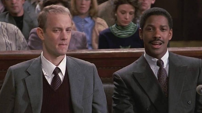 A frail Tom Hanks and Denzel Washington in court