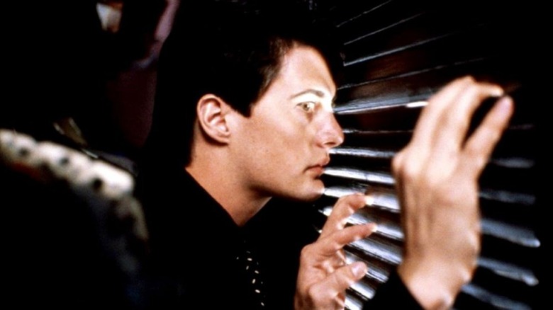 Kyle MacLachlan hiding in closet in Blue Velvet