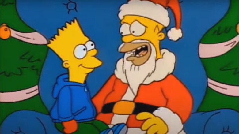 Bart sitting on Homer's lap