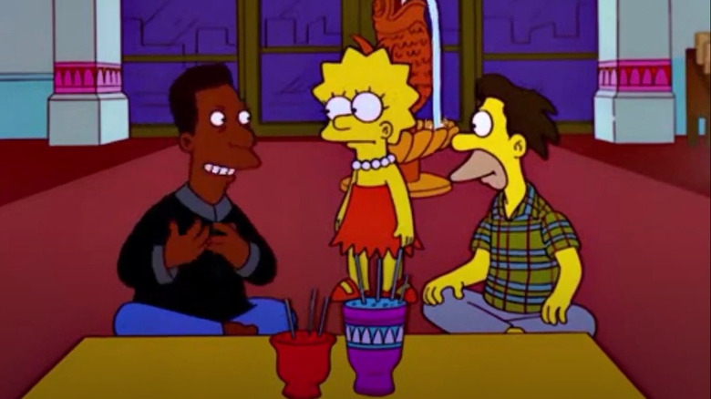 Lisa talking to Lenny and Carl