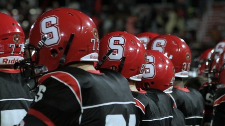 Helmets of Steubenville football players in Roll Red Roll