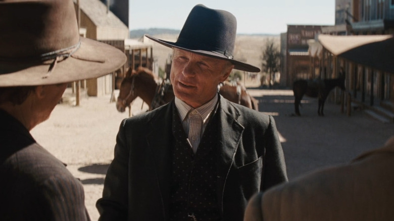 Ed Harris wearing cowboy hat