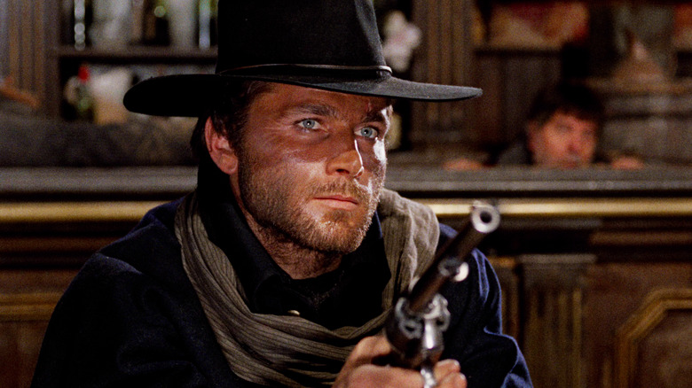 Franco Nero holds gun