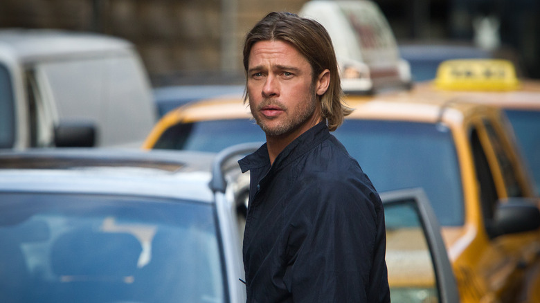 World War Z's Brad Pitt standing in traffic