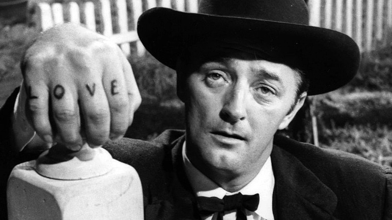 Robert Mitchum as Harry Powell