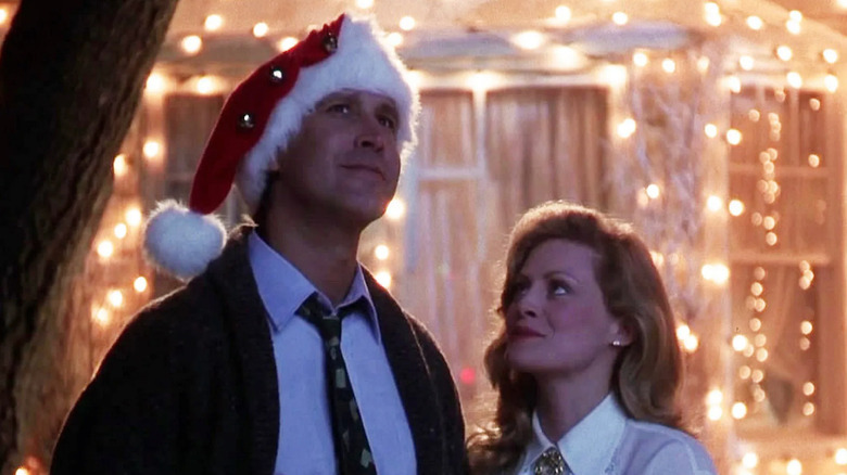 Chevy Chase and Beverly D'Angelo look at lights in National Lampoon's Christmas Vacation"