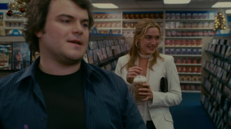 Kate Winslet and Jack Black brows a video store in The Holiday