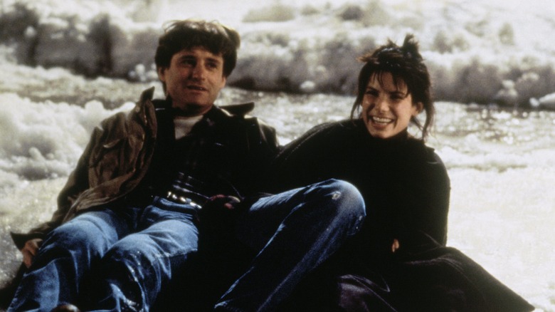 Sandra Bullock and Bill Pullman slip on ice in While You Were Sleeping