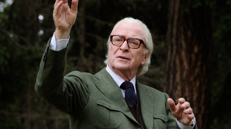 Michael Caine hands up