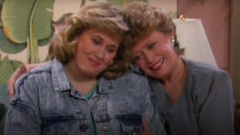 Shawn Schepps and Rue McClanahan in an embrace