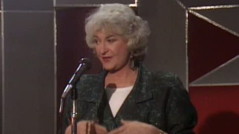 Bea Arthur with microphone