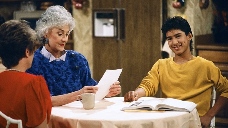 Rue McClanahan, Bea Arthur, and Mario Lopez at table