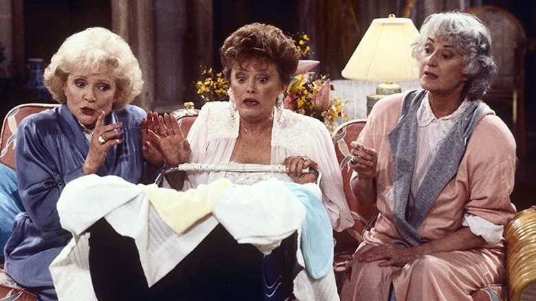 Betty White, Rue McClanahan, and Bea Arthur looking shocked