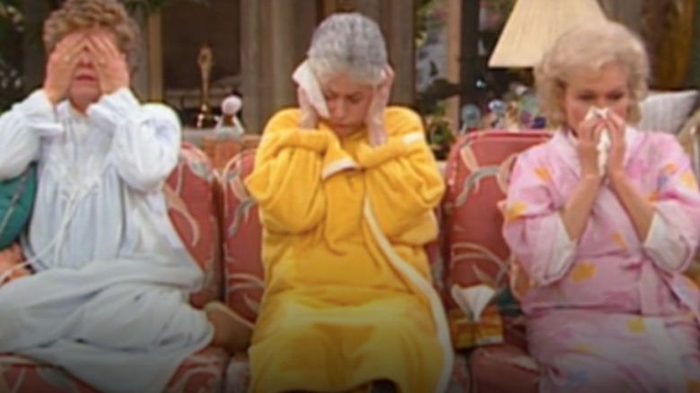 The cast of "The Golden Girls" seated on a couch