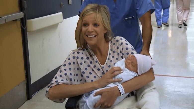 Kaitlin Olson holding baby Axel It's Always Sunny in Philadelphia