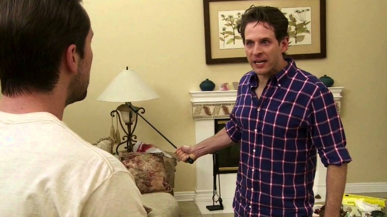 Glenn Howerton holding fire poker It's Always Sunny in Philadelphia