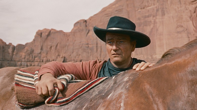 John Wayne black hat horseback The Searchers