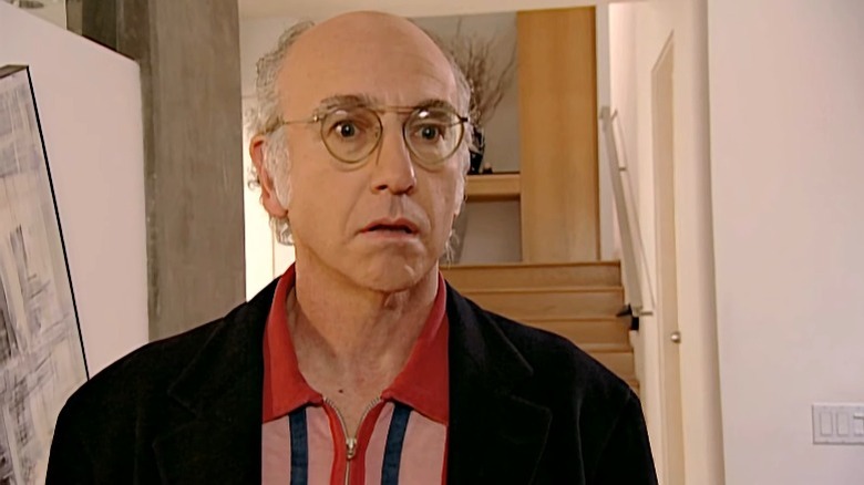 Curb Your Enthusiasm's Larry David with a despairing look on his face