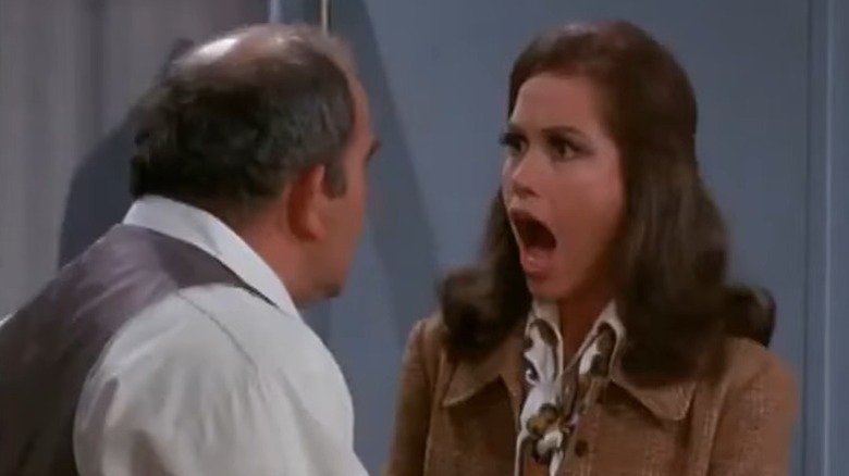 The Mary Tyler Moore Show's Mary looking at Lou with her mouth agape