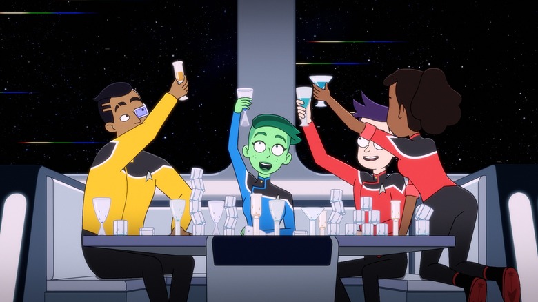 Rutherford, Tendi, Boimler, and Mariner raise a toast joyfully while sitting in a bar booth in the Cerritos, on Star Trek: Lower Decks