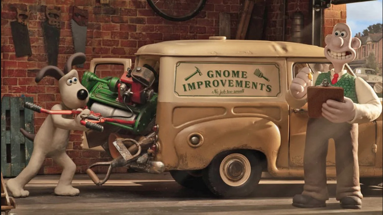 Gromit puts equipment in the back of a van that reads "Gnome Improvements" while Wallace looks on in Wallac & Gromit: Vengeance Most Fowl