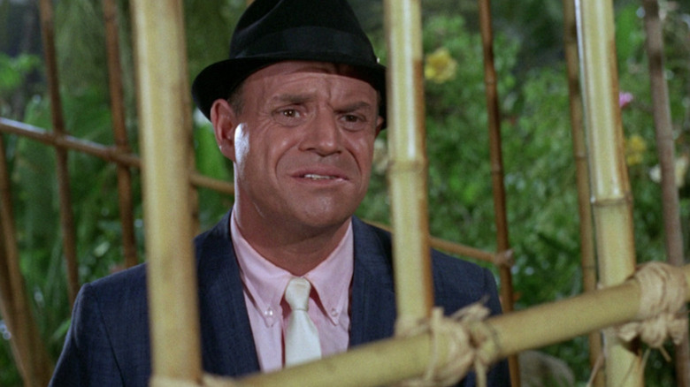 Don Rickles as Norbett Wiley is caged by the castaways on Gilligan's Island