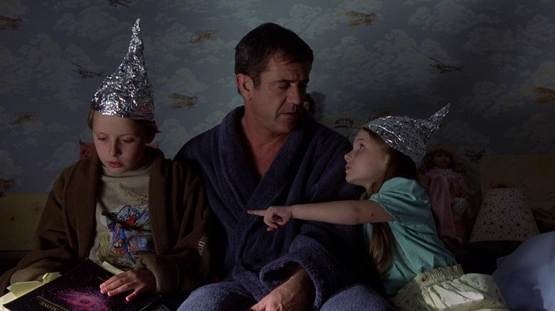 Mel Gibson as Graham comforting his children in Signs