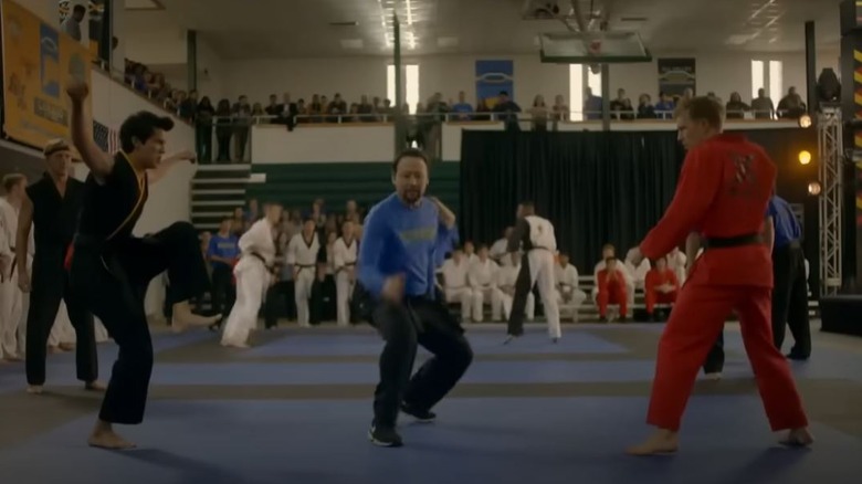 Xolo Maridueña's Miguel Diaz doing a Crane Kick on Cobra Kai