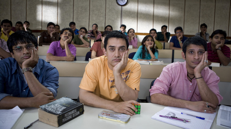 Ranchhoddas "Rancho" Shamaldas Chanchad flanked by his two best friends in 3 Idiots.