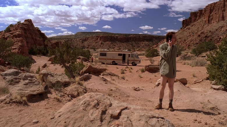 Walter White, wearing no pants, takes a phone call in the desert in Breaking Bad