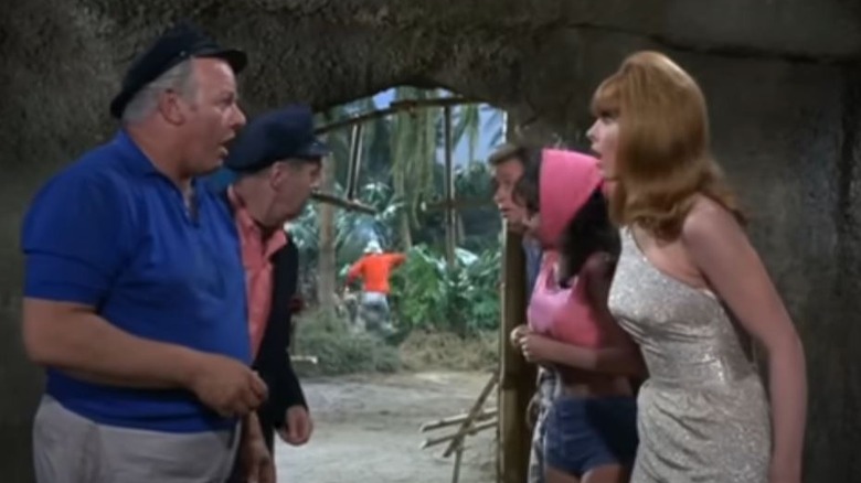 Alan Hale Jr.'s Skipper and the other castaways standing in a cave on Gilligan's Island