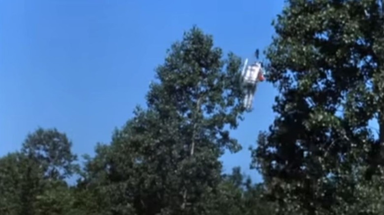 Bob Denver's Gilligan flying a jet pack on Gilligan's Island