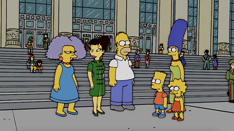 The Simpson family and Selma stand on a street in China in The Simpson