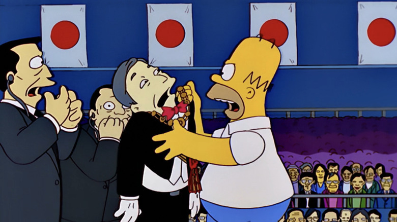 Homer Simpson grabs the Japanese emperor in The Simpsons