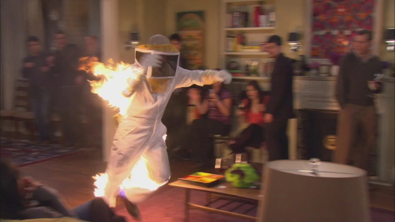 Guy in burning beekeeper outfit running HIMYM