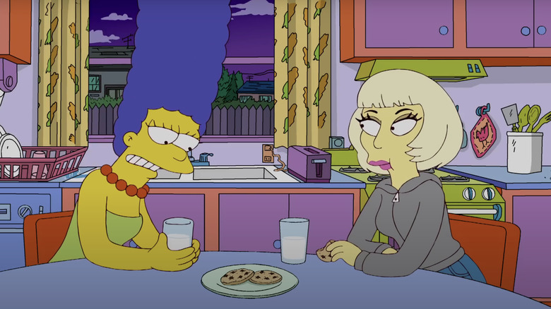 Lady Gaga sits opposite Marge at the kitchen table in The Simpsons