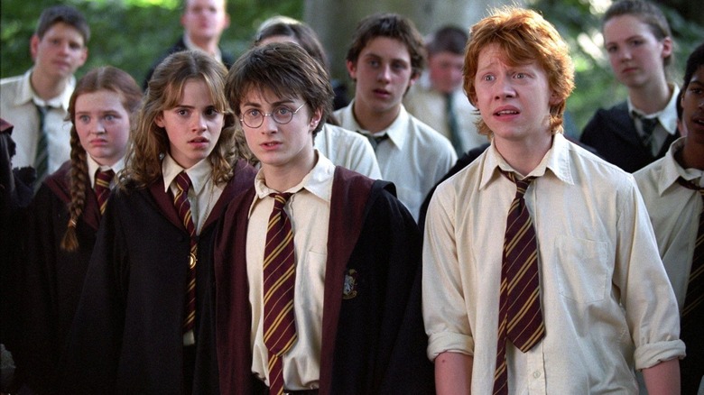 Hermione Harry and Ron looking shocked in Harry Potter and the Prisoner of Azkaban