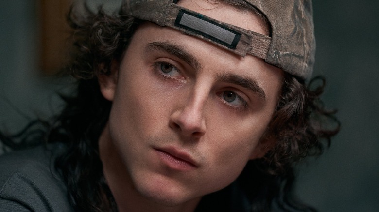 Chalamet in an ugly baseball cap.