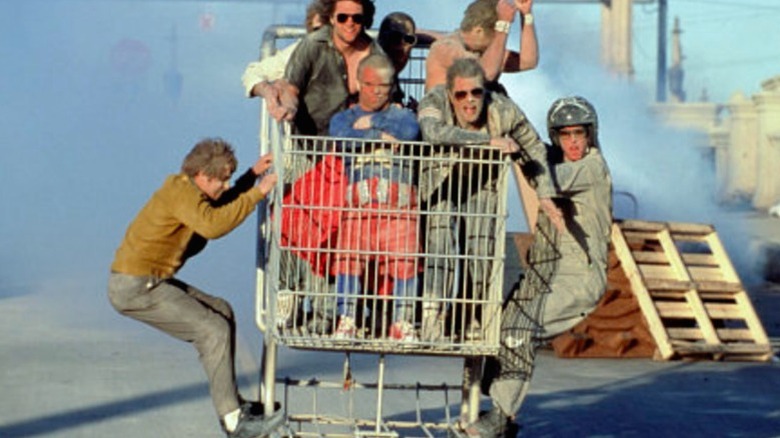 A bunch of idiots in a shopping cart "Jackass: The Movie"