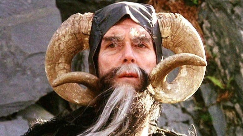 Tim wears horns in Monty Python and the Holy Grail